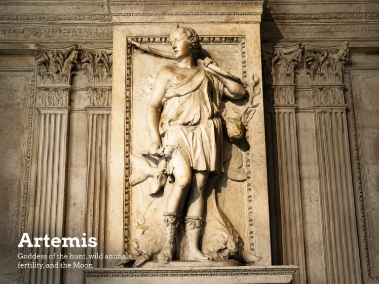 Marble statue of Artemis, the Greek goddess of the Moon, hunting, and wilderness, symbolizing the nurturing, intuitive, and protective qualities of the Cancer zodiac sign.