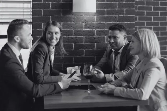 Capricorn enjoying meaningful conversation with close friends, reflecting the loyalty, trust, dependability, and lasting friendships valued by Capricorn.