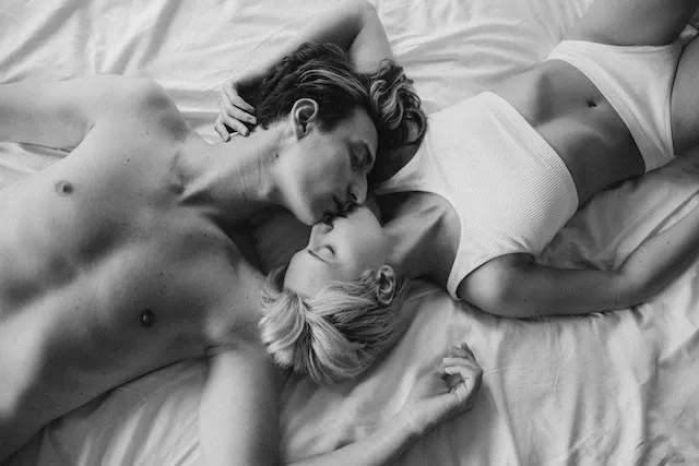 Romantic couple sharing an intimate moment, symbolizing the passionate, adventurous, and energetic compatibility between Sagittarius and Aries.