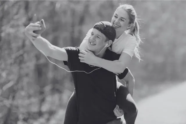 Happy couple sharing a joyful moment together, representing the caring, secure, and emotionally supportive relationship between Taurus and Cancer.